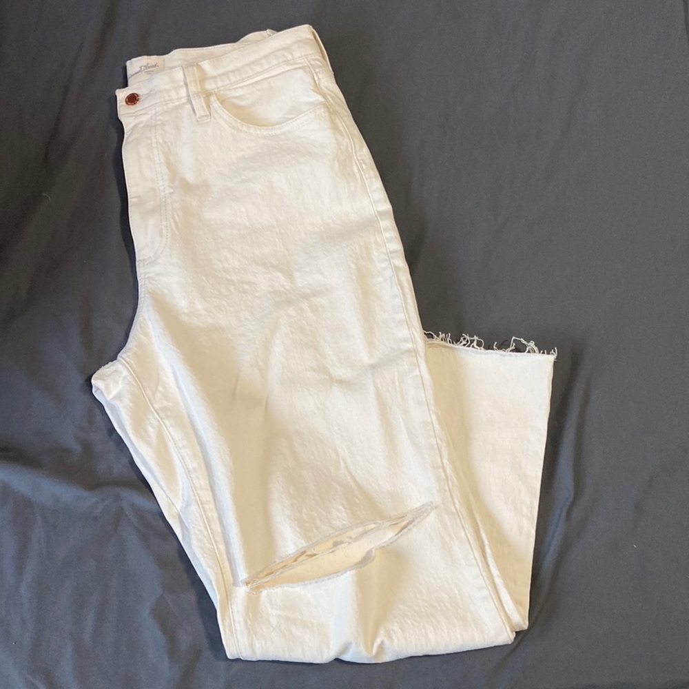 White jeans with slits